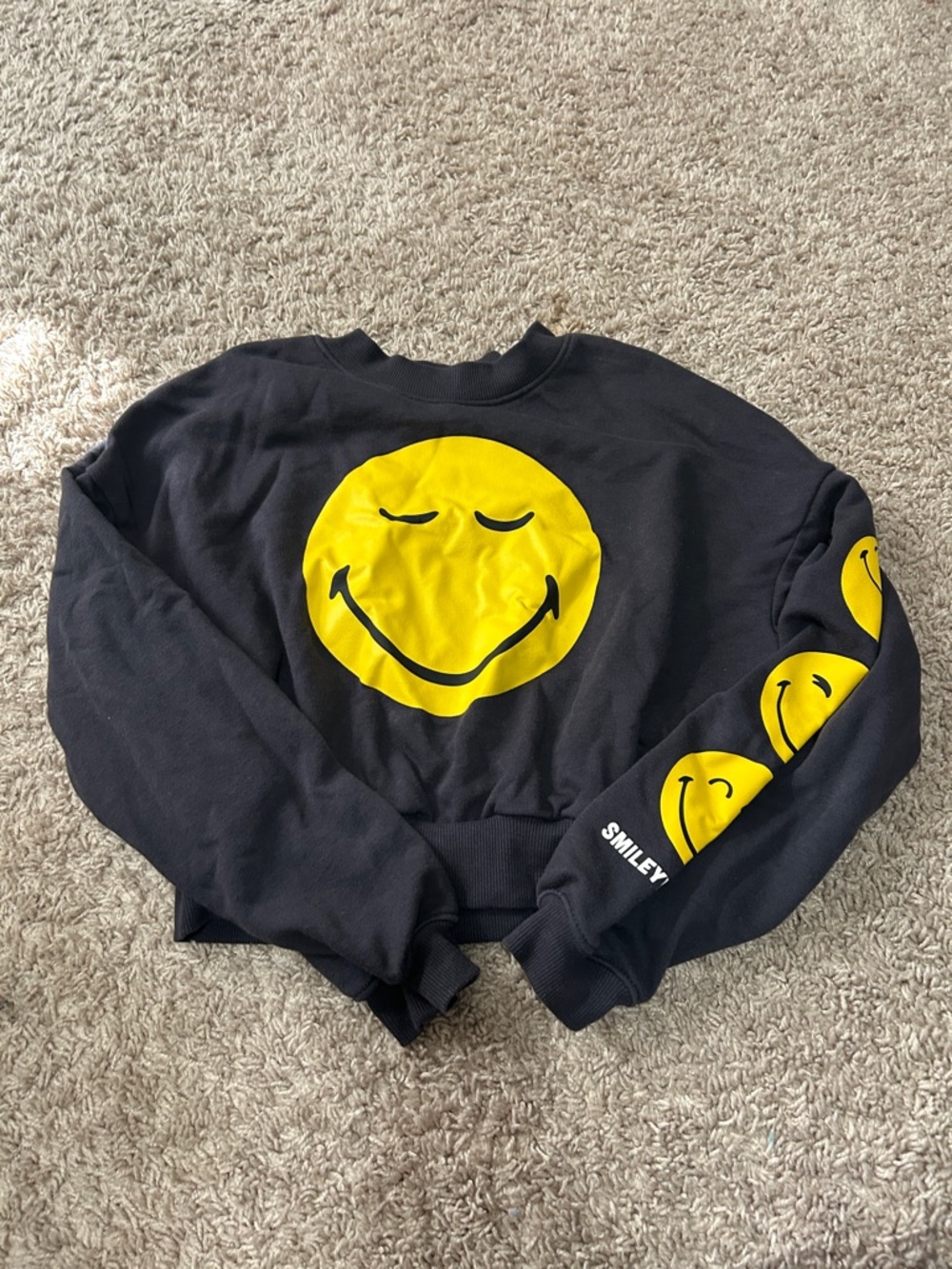 H&M Black Cropped Sweatshirt with Yellow Smiley Graphic